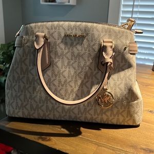 micheal kors purse. hardly ever used. maybe once or twice. with tags